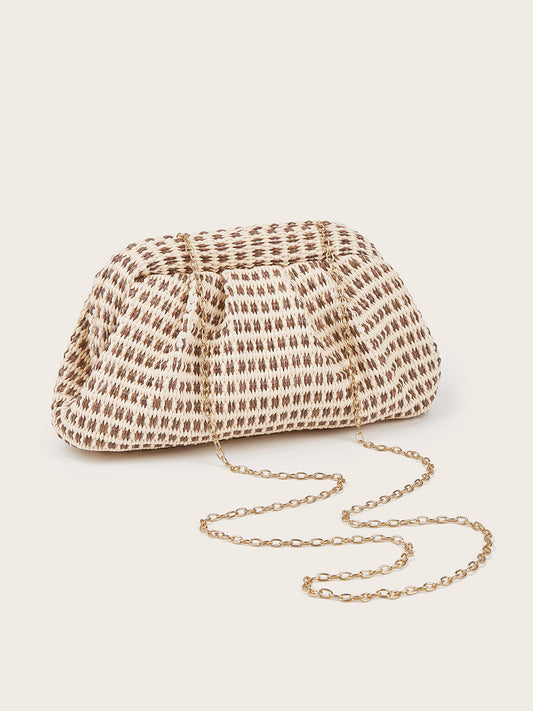 Bolso de mano tipo clutch con solapa tejida bidireccional