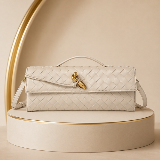 Bolso de mano tipo clutch con solapa tejida bidireccional